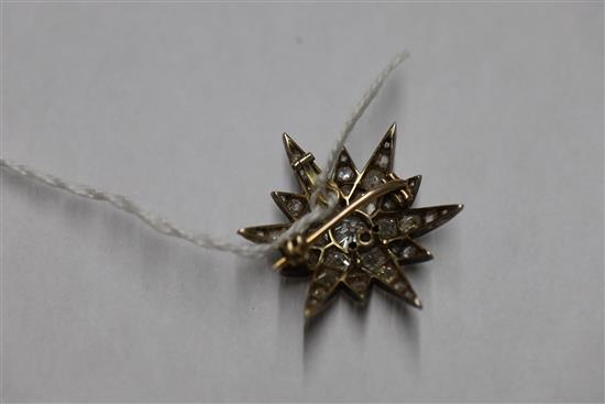 A Victorian gold, silver and old mine and cushion cut diamond set starburst pendant brooch,